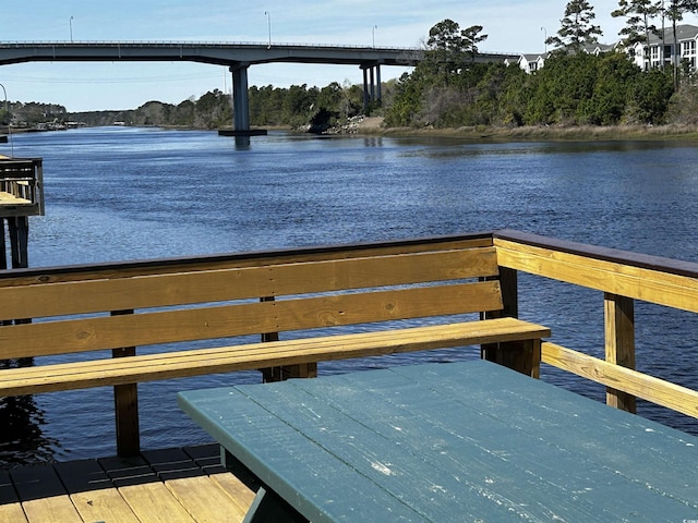 dock area featuring a water view