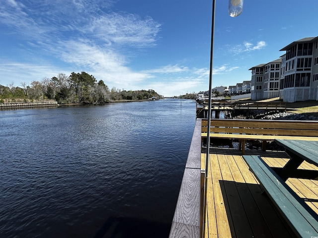 view of dock with a water view