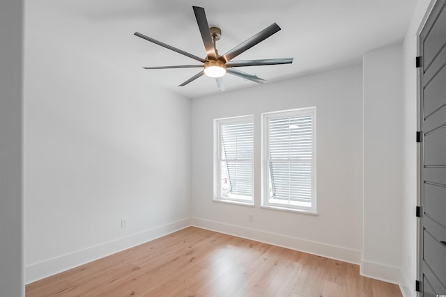 spare room with light hardwood / wood-style floors and ceiling fan