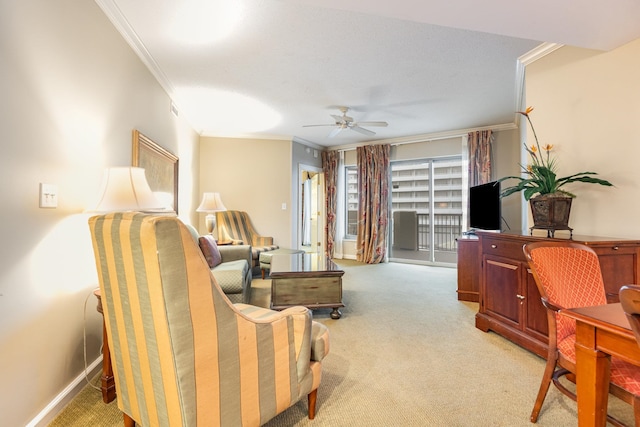 living room with light carpet, crown molding, and ceiling fan