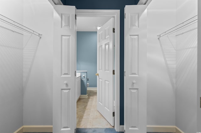 bathroom featuring tile floors