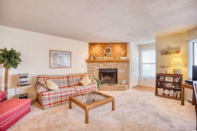 carpeted living room with a textured ceiling, a brick fireplace, a healthy amount of sunlight, and wood walls