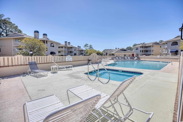 view of pool with a patio