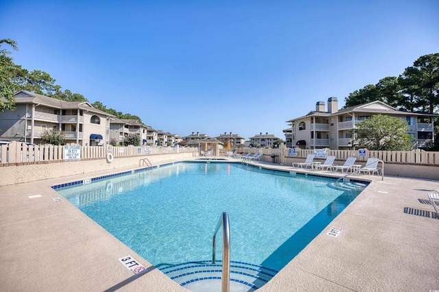 view of pool featuring a patio