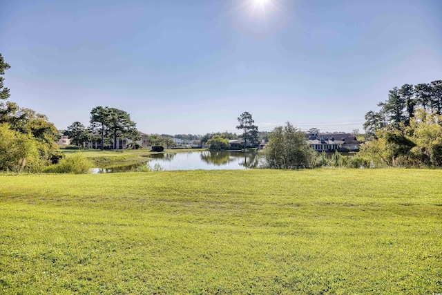 view of yard with a water view