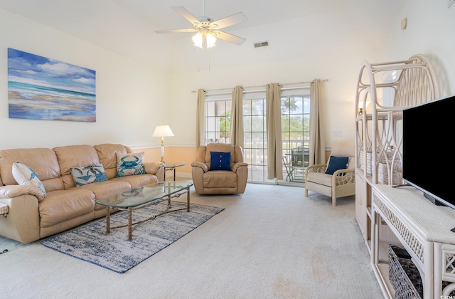 living room featuring ceiling fan and light carpet