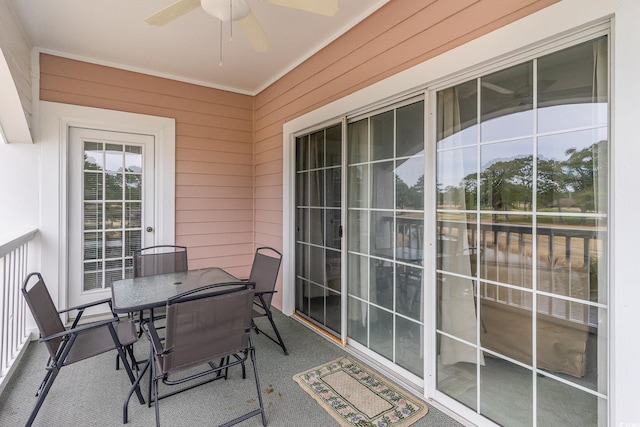 balcony featuring ceiling fan