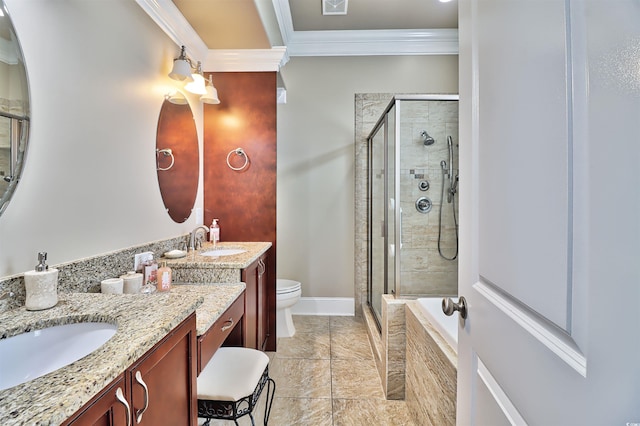 bathroom featuring crown molding, tile floors, vanity, a shower with shower door, and toilet