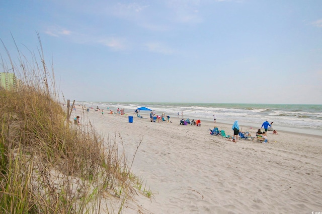 property view of water featuring a beach view