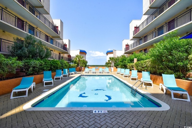 view of pool with a patio