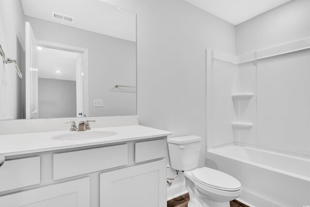 233 Sandridgebury Dr Unit 57, Little River, SC 29566 - bathroom with visible vents, shower / tub combination, wood finished floors, vanity, and toilet