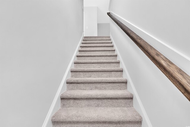 233 Sandridgebury Dr Unit 57, Little River, SC 29566 - stairs featuring carpet