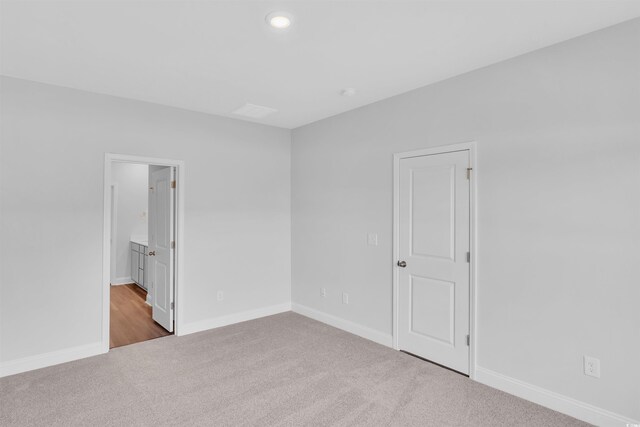 233 Sandridgebury Dr Unit 57, Little River, SC 29566 - carpeted empty room with recessed lighting and baseboards