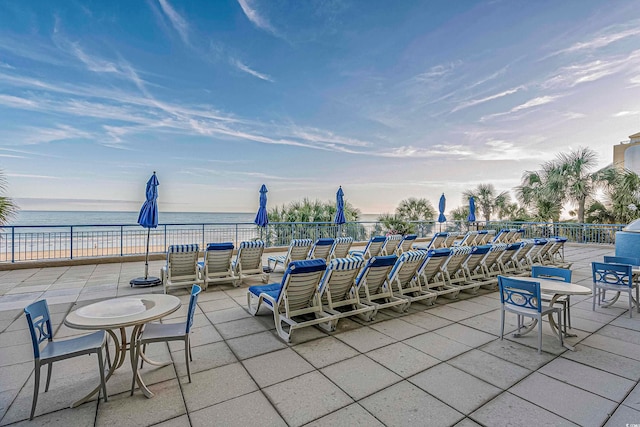 view of terrace featuring a water view