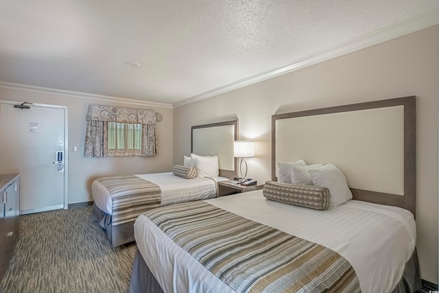 bedroom with ornamental molding and a textured ceiling