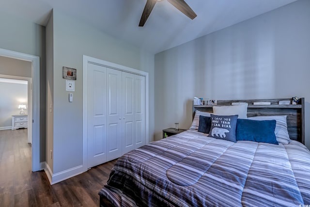 bedroom with ceiling fan, a closet, and dark hardwood / wood-style flooring