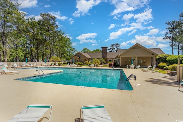 view of pool featuring a patio area