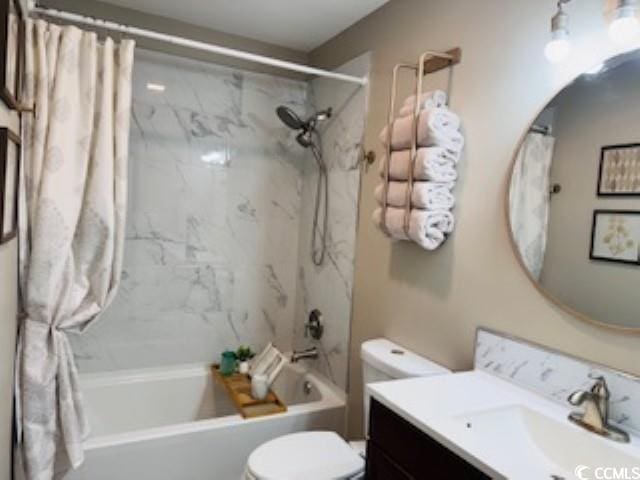 full bathroom with shower / tub combo with curtain, vanity, and toilet