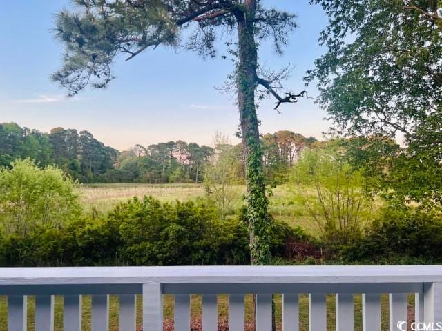 yard at dusk with a balcony