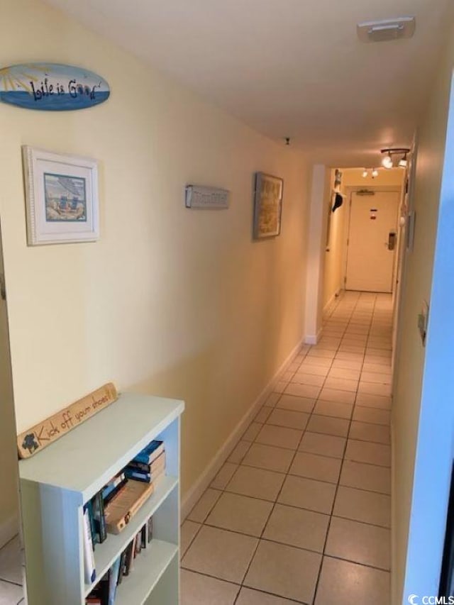 hallway with light tile flooring