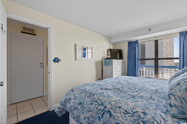 bedroom featuring tile flooring