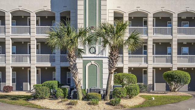 view of property featuring central AC unit