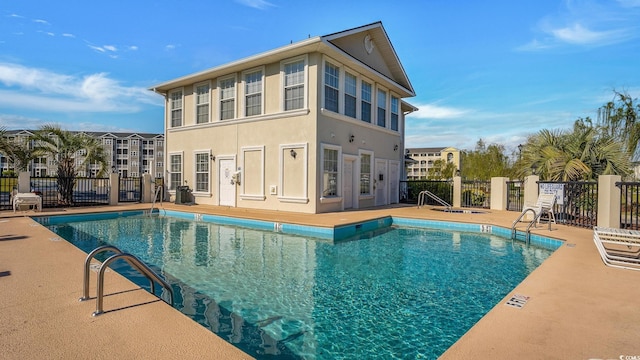 view of swimming pool featuring a patio