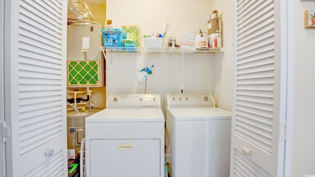 washroom with washer and clothes dryer