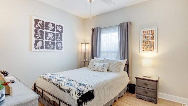 bedroom featuring ceiling fan and light wood-type flooring