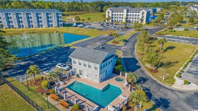 drone / aerial view with a water view