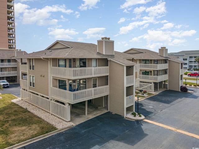 view of property with a carport