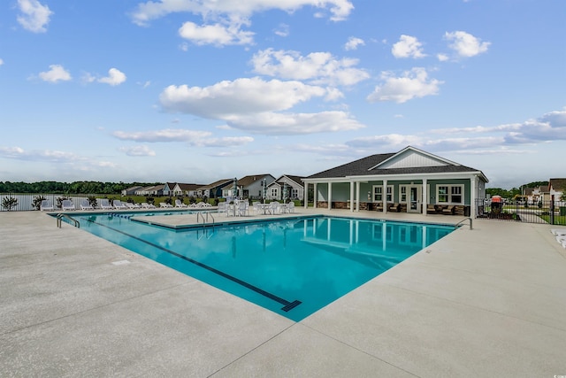 view of swimming pool with a patio area