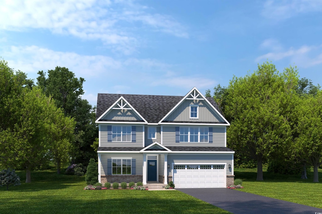 craftsman-style home featuring a garage and a front yard