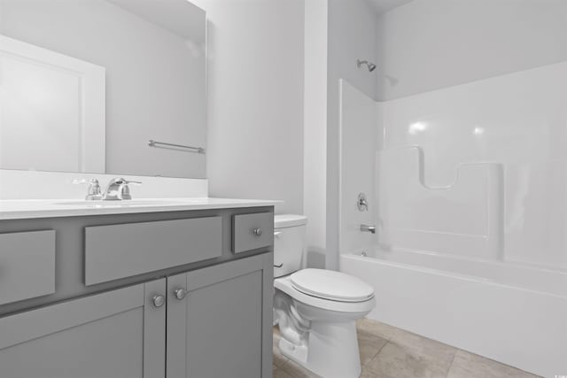 full bathroom featuring tile patterned floors, vanity, toilet, and shower / bathing tub combination