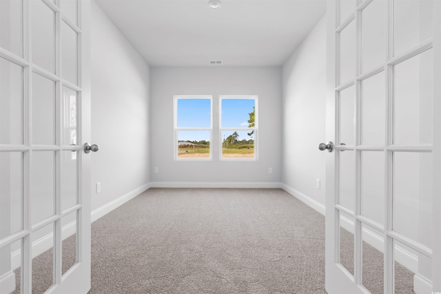 spare room with carpet flooring