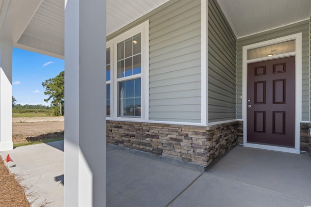 entrance to property with a porch