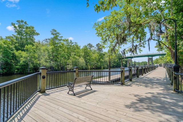 deck featuring a water view