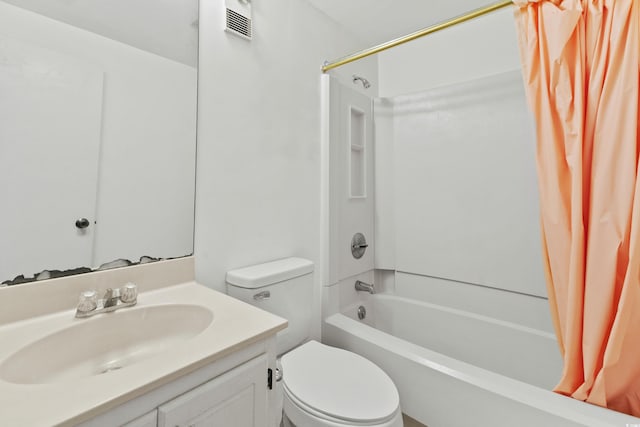 full bathroom featuring shower / bath combo, toilet, and vanity