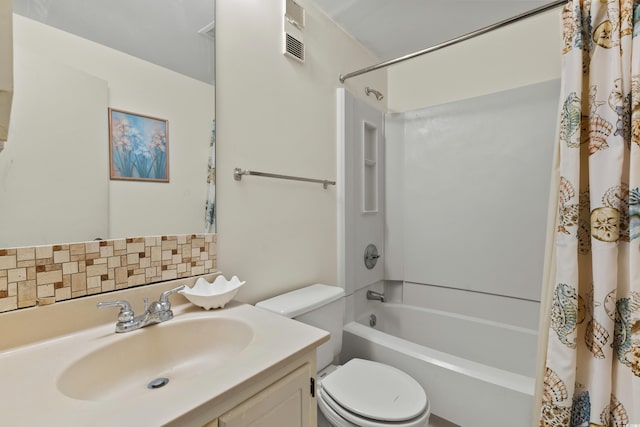 full bathroom featuring vanity, toilet, and shower / bath combo with shower curtain