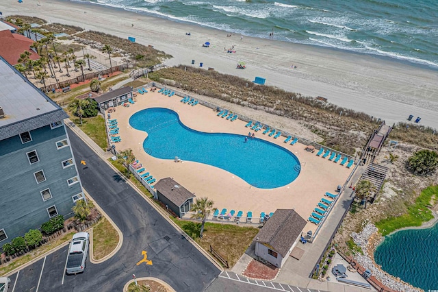 aerial view with a beach view and a water view