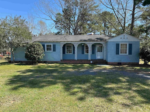 ranch-style house with a front lawn