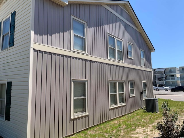 view of property exterior with central AC unit