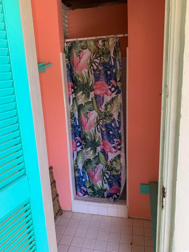 bathroom with tile flooring