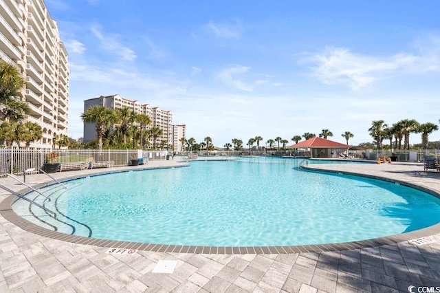 view of pool featuring a patio area