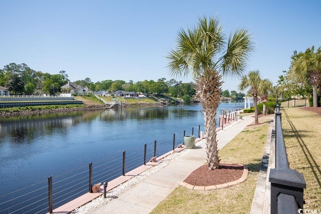 view of property's community with a water view