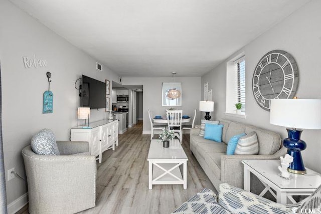 living room featuring light wood-type flooring