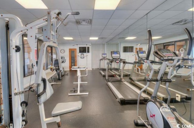 workout area with a drop ceiling