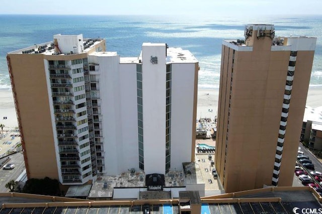 view of building exterior with a water view