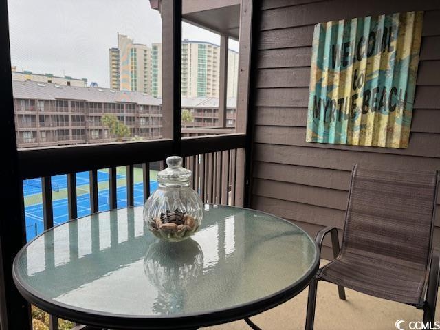212 2nd Ave N Unit 362, North Myrtle Beach, SC 29582 - balcony featuring a view of city and outdoor dining space