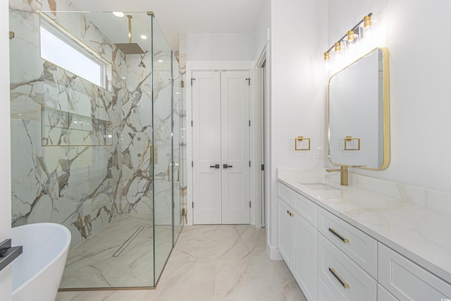 bathroom featuring a freestanding tub, vanity, marble finish floor, a closet, and a marble finish shower